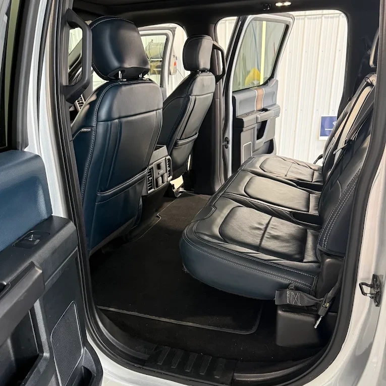 Black leather rear seat of a detailed truck