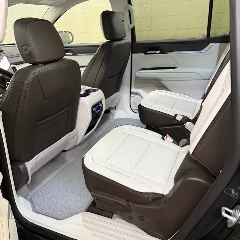 White and brown leather seats after interior detailing