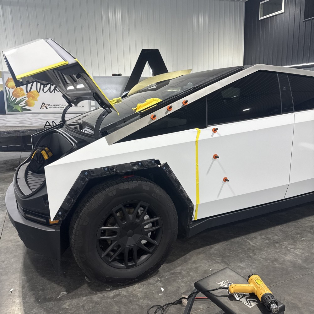 Front fender and door during wrap installation